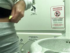 Risky masturbation and pissing in the airplane toilet